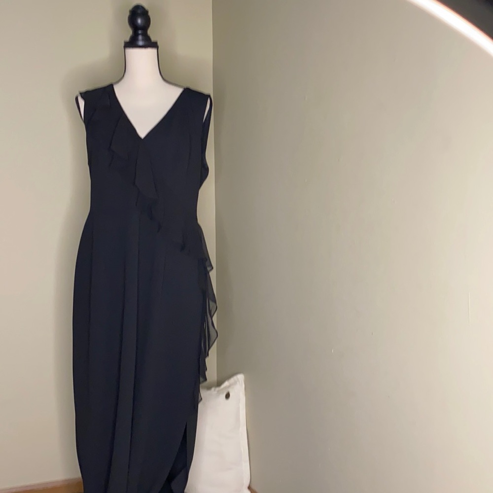 Black gown with ruffle details.